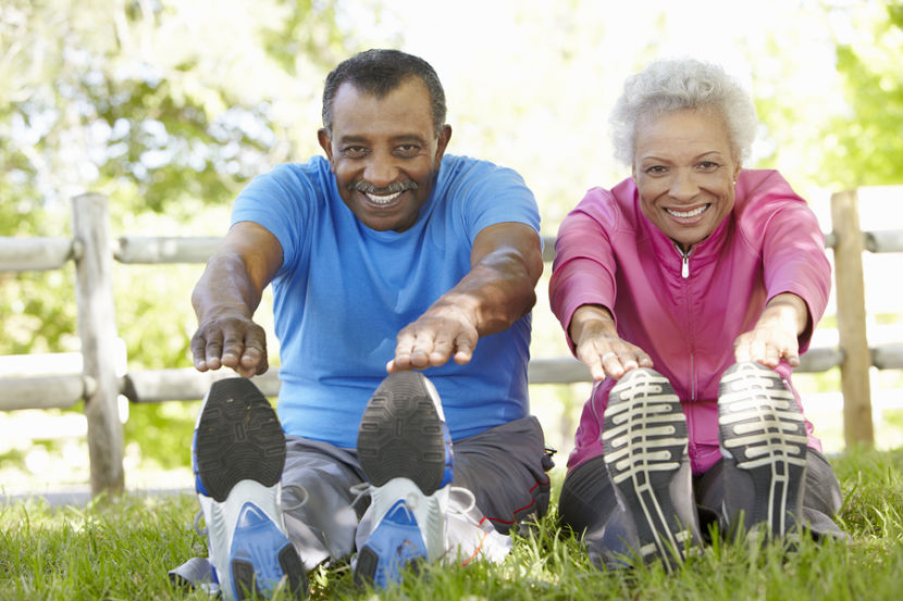 senior couple stretching